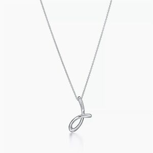 Tiffany & Co. Elsa Peretti “J” pendant in sterling silver